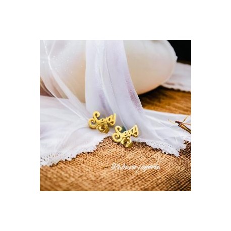 Aretes dorados diseño sexi inoxidable 316L