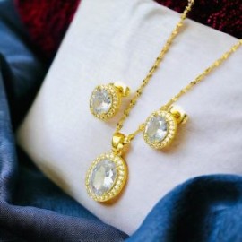 Conjunto dorado piedra blanca chapa de oro 18k