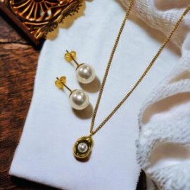 Conjunto dorado acero inoxidable perlas