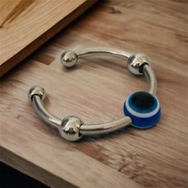Anillo ajustable acero inoxidable color plata ojo azul