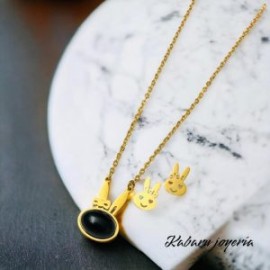 Conjunto conejo piedra negra acero inoxidable