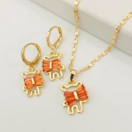 Conjunto osito piedra roja chapa de oro 18K